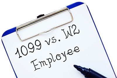 7 Most Costly Accounting Mistakes Small Business Make. Photo of clipboard with decision 1099 vs W2 employee