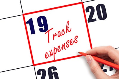 7 Most Costly Accounting Mistakes Small Business Make. Photo of woman setting time to track expenses